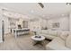 Open-concept living area with a large island, stainless steel appliances, and a comfortable living space at 5954 E Cat Balue Dr, Phoenix, AZ 85054