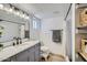 Updated bathroom with a modern vanity, subway tile shower, and stylish fixtures at 624 N Ashbrook Cir, Mesa, AZ 85213