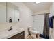 Simple bathroom with a shower and wood-look laminate flooring at 624 N Ashbrook Cir, Mesa, AZ 85213