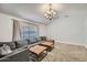 Spacious living room with comfortable seating, neutral tones, and natural light at 624 N Ashbrook Cir, Mesa, AZ 85213