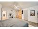Relaxing main bedroom featuring closet space, a ceiling fan and neutral decor at 624 N Ashbrook Cir, Mesa, AZ 85213
