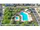 Aerial view of community pool area with pool, spa, and outdoor furniture at 6621 E Villa Rita Dr, Phoenix, AZ 85054