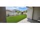 Well-maintained backyard featuring lush artificial turf and privacy wall at 6621 E Villa Rita Dr, Phoenix, AZ 85054