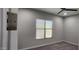 Neutral bedroom featuring carpeted floors, a window with blinds, and a simple design with natural light at 6621 E Villa Rita Dr, Phoenix, AZ 85054