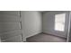 Carpeted bedroom with natural light and a window with blinds at 6621 E Villa Rita Dr, Phoenix, AZ 85054