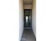 Inviting entryway showcases the home's interior with wood-look flooring and natural light streaming through the back at 6621 E Villa Rita Dr, Phoenix, AZ 85054