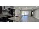 Spacious kitchen boasts modern appliances, an island with a sink, and an open layout into the living area at 6621 E Villa Rita Dr, Phoenix, AZ 85054