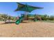 Community playground for children, featuring swings, slides and shade at 6621 E Villa Rita Dr, Phoenix, AZ 85054