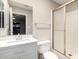 A bathroom featuring a vanity with marble top, new faucet, and shower at 6818 N 35Th Ave # C, Phoenix, AZ 85017