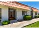 Charming townhome with a red-tile roof and a well-maintained front yard in a residential community at 6818 N 35Th Ave # C, Phoenix, AZ 85017