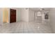 Bright and spacious living area features tiled floors and flows into a well-lit kitchen at 6818 N 35Th Ave # C, Phoenix, AZ 85017