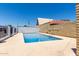 Community pool featuring clear blue water, a safety ring, and secure fencing at 6818 N 35Th Ave # C, Phoenix, AZ 85017