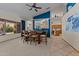 Open-concept dining room with elegant decor and seamless flow to the kitchen and living areas at 7315 W Monte Lindo Ln, Glendale, AZ 85310