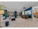 Bright and spacious living room with large windows overlooking the backyard and pool area at 7315 W Monte Lindo Ln, Glendale, AZ 85310