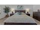 Bright main bedroom features a large bed, bedside tables, and a calming ambiance at 7315 W Monte Lindo Ln, Glendale, AZ 85310