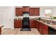 Modern kitchen features granite countertops and stainless steel appliances at 7324 S 254Th Dr, Buckeye, AZ 85326