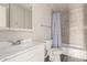 Cozy bathroom with stylish tile accents has a shower and tub at 7619 W Clarendon Ave, Phoenix, AZ 85033