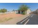 Single-story home with rock landscaping and a convenient driveway at 7619 W Clarendon Ave, Phoenix, AZ 85033