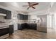 Modern kitchen featuring stainless steel appliances and updated countertops at 7619 W Clarendon Ave, Phoenix, AZ 85033