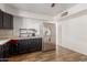 Functional kitchen featuring stainless steel appliances and laminate floors at 7619 W Clarendon Ave, Phoenix, AZ 85033