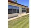 Side exterior view showing well-maintained siding and multiple windows, offering ample natural light at 8161 E Keats Ave # 376, Mesa, AZ 85209
