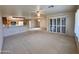 Spacious living room showcases the open floor plan, connecting to the kitchen area at 8161 E Keats Ave # 376, Mesa, AZ 85209