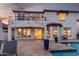 Expansive backyard with pool, spa, patio, balcony, and beautiful sunset views at 861 E Canyon Way, Chandler, AZ 85249