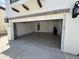 Spacious garage with an automatic door provides secure parking and additional storage, plus direct access to inside home at 861 E Canyon Way, Chandler, AZ 85249