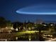Night shot of sky phenomena over houses, green spaces and pond at 861 E Canyon Way, Chandler, AZ 85249