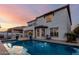 Lovely backyard pool and spa with patio, chairs, grill, and landscaping at 861 E Canyon Way, Chandler, AZ 85249
