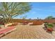 Outdoor patio featuring a stone fire pit, seating, barbeque and view of the Arizona desert at 8687 W Bajada Rd, Peoria, AZ 85383