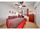 Bedroom featuring neutral walls, ceiling fan, window, and carpet at 8687 W Bajada Rd, Peoria, AZ 85383