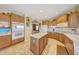 Gourmet kitchen with center island, double ovens, and ample cabinet space for storage at 8687 W Bajada Rd, Peoria, AZ 85383