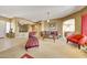 Open-plan living space with neutral tones, comfortable seating, and an open flow to other rooms at 8687 W Bajada Rd, Peoria, AZ 85383