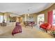 Open-plan living space with neutral tones, comfortable seating, and an open flow to other rooms at 8687 W Bajada Rd, Peoria, AZ 85383