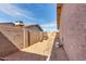 A clean backyard with durable block fencing creates a private and usable outdoor space at 940 S Revere --, Mesa, AZ 85210