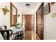 Inviting foyer with tile flooring, wooden door with sidelights, and adjacent closet at 940 S Revere --, Mesa, AZ 85210