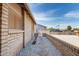 A neatly kept side yard features decorative gravel and charming landscape features at 940 S Revere --, Mesa, AZ 85210