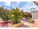 A charming backyard featuring blooming flowers and foliage for enjoyable outdoor living at 940 S Revere --, Mesa, AZ 85210