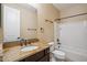 Bathroom with granite countertops, undermount sink, and combination shower and tub at 9921 E Acceleration Dr, Mesa, AZ 85212