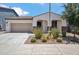 Charming single-story home with a well-maintained yard and a neutral color scheme at 9921 E Acceleration Dr, Mesa, AZ 85212