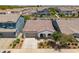 Aerial view of charming single-Gathering home featuring a tile roof and neat desert landscaping at 9921 E Acceleration Dr, Mesa, AZ 85212