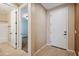 Interior hallway with a linen closet and views into a bathroom and bedroom at 9921 E Acceleration Dr, Mesa, AZ 85212