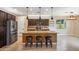 Spacious kitchen features a large island, granite counters, and stainless steel refrigerator at 9921 E Acceleration Dr, Mesa, AZ 85212
