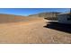 Expansive lot provides ample space for personalization, featuring mountain views and a privacy wall at 10043 S 23Rd Dr, Phoenix, AZ 85041