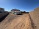 Expansive yard for landscaping with a privacy fence and mountain views at 10043 S 23Rd Dr, Phoenix, AZ 85041