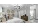 Relaxing main bedroom with decorative wall art, a decorative chandelier, and ensuite bathroom at 10043 S 23Rd Dr, Phoenix, AZ 85041
