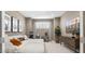 Cozy movie room features a large white sectional, movie-themed decor, and neutral tones for relaxed entertainment at 10043 S 23Rd Dr, Phoenix, AZ 85041