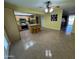 Eat-in kitchen with an island, stainless steel appliances, tile flooring, and an open layout at 11221 N 91St Dr, Peoria, AZ 85345