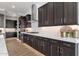 Modern kitchen features stainless steel appliances, sleek cabinets, and ample counter space at 1145 E Gleneagle Dr, Chandler, AZ 85249